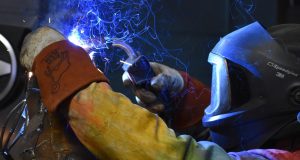 John Pahlas welding a sculptor
